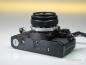Preview: Olympus OM-10 black mit Manual Adapter und Zuiko 1.8/50mm