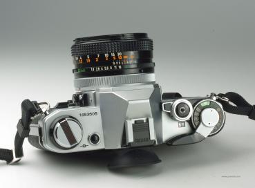 Canon AE-1 + FD 50mm f/1.8 S.C.